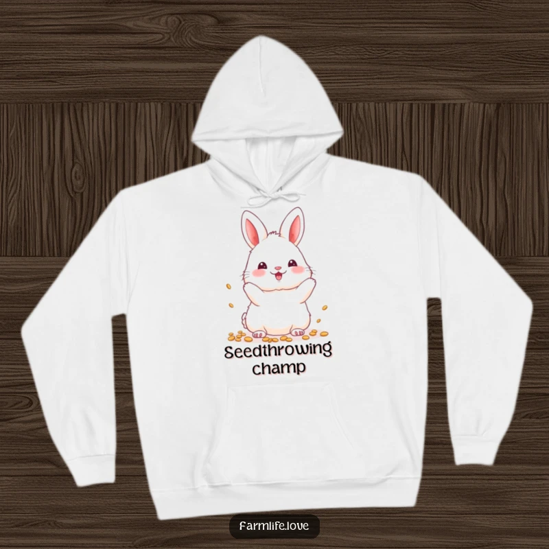 Funny Hoodie: A fluffy white bunny happily scattering seeds, radiating cute garden charm.